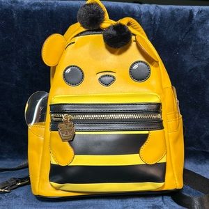 Loungefly POP Winnie the Pooh as a Bee mini backpack.